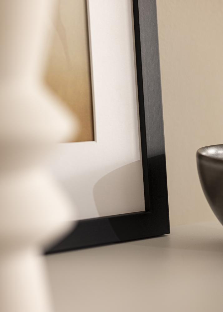 Okvir črna les 68x98 cm - Paspartȗ Bela 56x76 cm