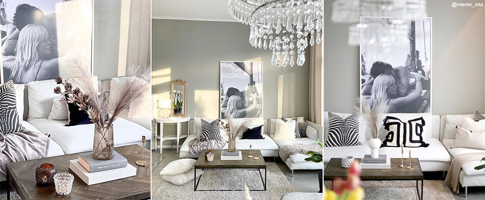 Bela velika slika v črno-belem foto okvirju v svetli dnevni sobi